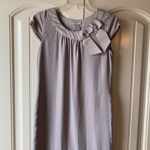 Adorable Gray Brown dress with Bow Accent.